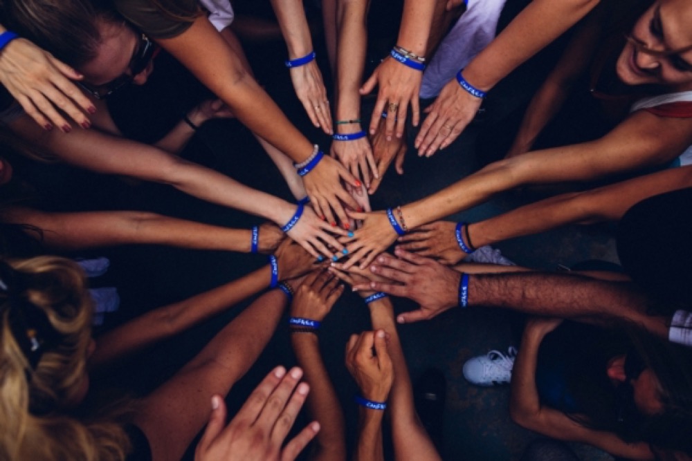 Hands united in community